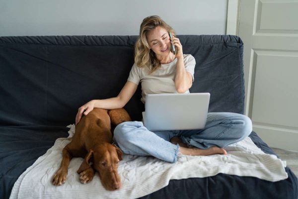 Woman,Sitting,At,Couch,,Stroking,Her,Lovely,Vizsla,Dog,,Talking