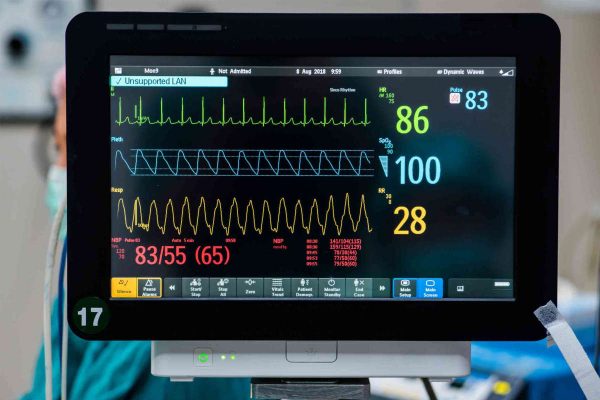 Monitor vital signs for patient in hospital.
